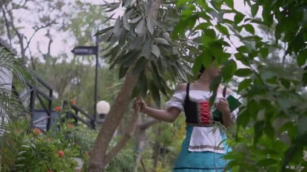 Glamour School Girls Walking Jungle While Holding Book Wearing Skirt — Stockvideo