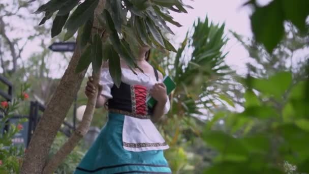 Glamour School Girls Walking Jungle While Holding Book Wearing Skirt — Stockvideo