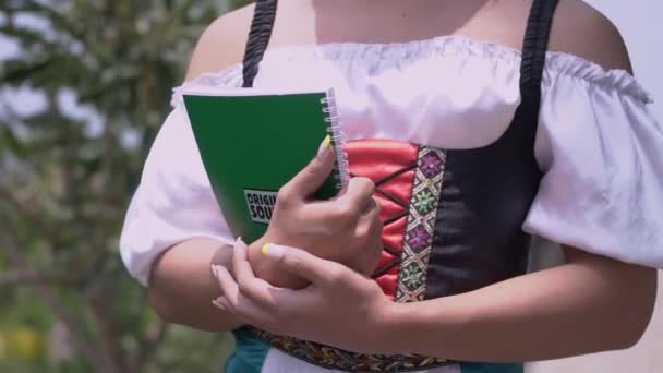 Beautiful School Girl Walking Short Dress While Holding Book Hand — Stockvideo