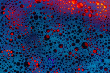 Abstract blue background. Colored soap foam texture. Gel foam with bubbles.