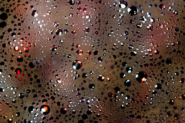 Soap foam. Background of dusty foam with bubbles of blue color for an inscription. Abstract multicolored, white, red, blue background. Colored soap foam texture. Shampoo foam with bubbles.
