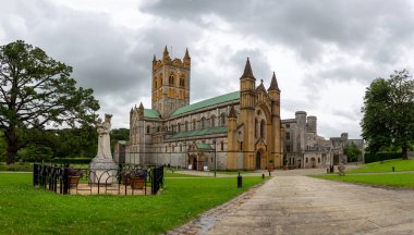 Buckfast Abbey an active Benedictine monastery at Buckfast, near Buckfastleigh, Devon, England with Madonna and child in front