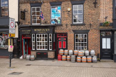 Colourful Kegs outside Blind Jack's Traditional Ale House in Knaresborough North Yorkshire named after Jack Metcalf the famous road surveyor