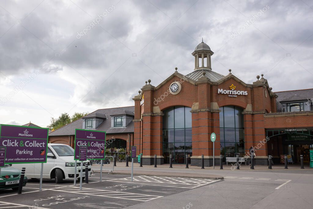 Click and collect signs and parking bay at Morrisons supermarket