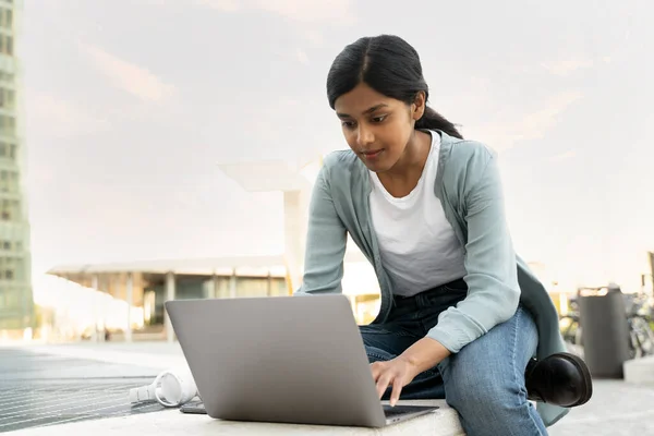 Pensive Indian Student Using Laptop Computer Studying Exam Preparation Sitting — Stock Photo, Image