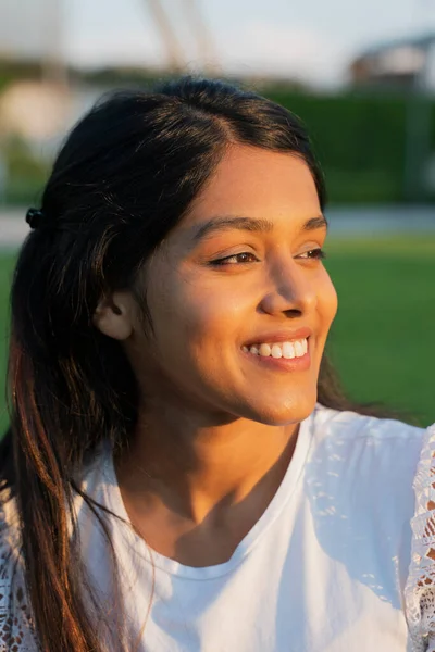 Close Portrait Happy Indian Woman Looking Away Sitting Park Summer — Stok fotoğraf