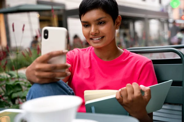 Beautiful Smiling Indian Woman Holding Mobile Phone Communication Online Sitting — Stockfoto