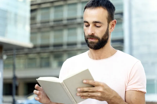 Handsome Bearded Hispanic Man Reading Book Outdoors Pensive Student Studying — Stockfoto