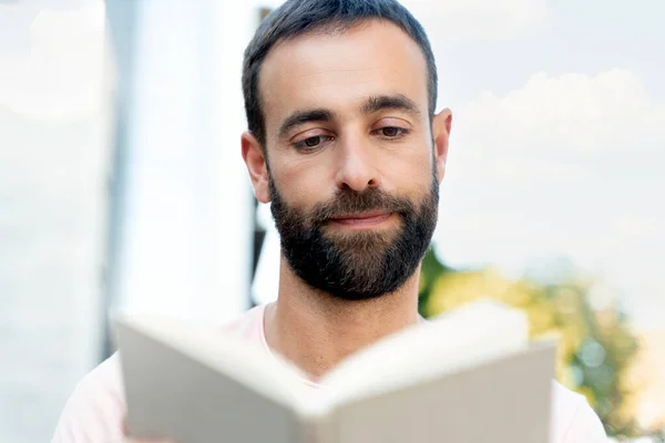 Closeup Portrait Handsome Hispanic Man Reading Book Outdoors Pensive Student — ストック写真