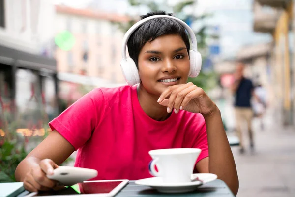 Portrait Smiling Cheerful Indian Woman Listening Music Wearing Wireless Headphones — Stock Photo, Image