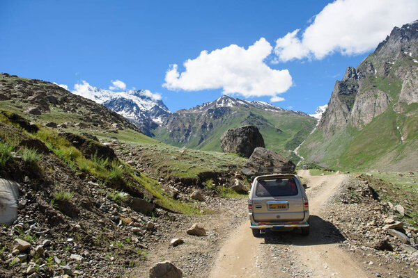 KASHMIR, INDIA - July 14 : Car tourist on the way go to snow moutain on July 14,2015 in KASHMIR, INDIA