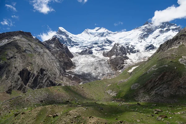 Moutain covered with snow and could bule sky