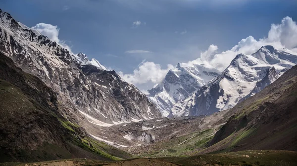 Moutain covered with snow and could bule sky