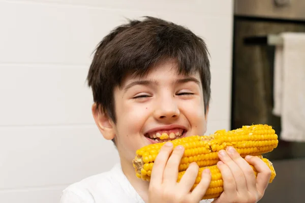 Cheerful Child Eats Boiled Corn Baby Food Nutrition Organic —  Fotos de Stock