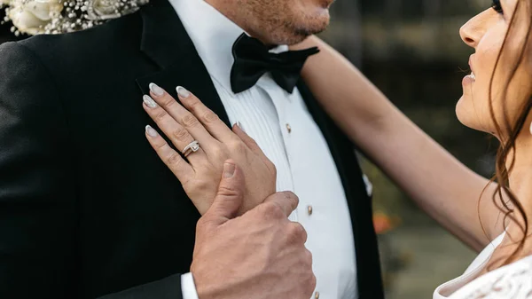 Hands Newlyweds Holding Groom Bow Tie — Fotografia de Stock