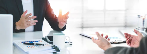 Businessman giving advice and make business, investment, financial and future planning deals in the office.