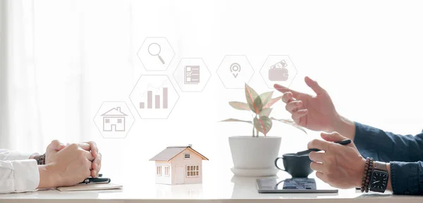 Real estate agents are recommending to provide information about housing to customers. Buy house, real estate concept. 