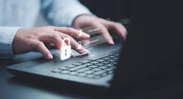 Businessman typing on keyboard laptop computer to input username and password for or technology security system and prevent hacker concept.