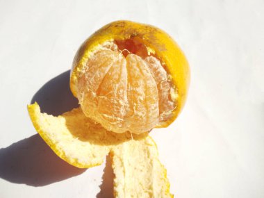 orange isolated on a white background.high angle view.Oranges are native to a region that includes Southern China, Northeast India, and Myanmar, and the earliest mention of sweet oranges is in Chinese literature in 314 BC.