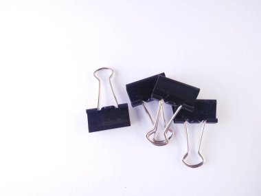 Office black paper clip isolated on white background.high angle view.