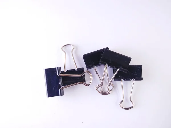 Office black paper clip isolated on white background.high angle view.