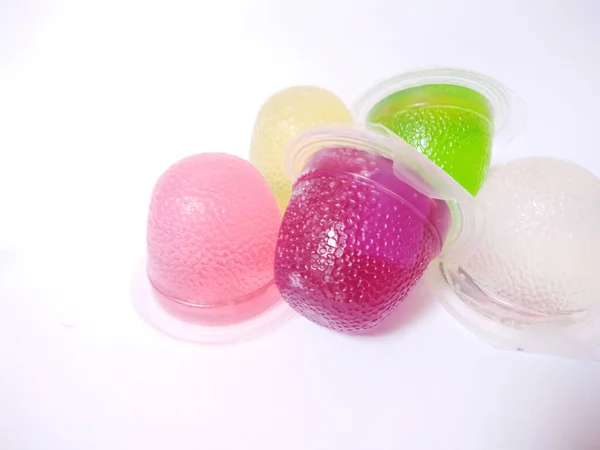 jelly color purple, green, white, pink, yellow. isolated on a white background. close up.