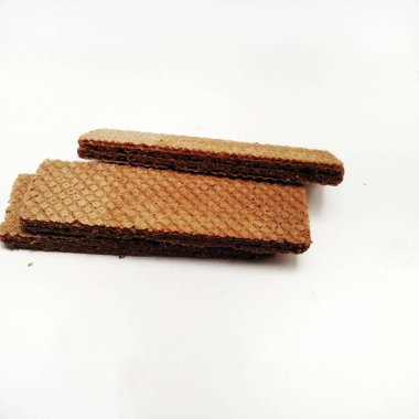 Beyaz arka planda izole edilmiş lezzetli çikolatalı gofretler. arkaplan, kapak, pankart, reklam ve daha fazlası için.