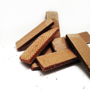 Beyaz arka planda izole edilmiş lezzetli çikolatalı gofretler. arkaplan, kapak, pankart, reklam ve daha fazlası için.