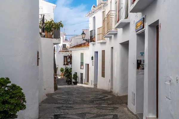 FRIGILIANA, SPAIN - January 28 2022: Situated in South of Spain, Frigiliana is a touristic travel destination, a village situated on the hills, with white houses, small roads. Typically Andalusian