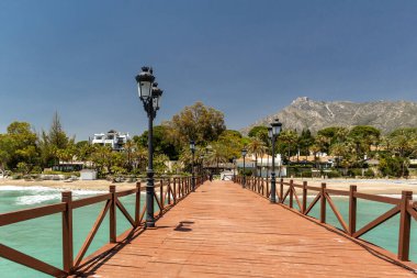 Panoramic view of red wood bridge 
