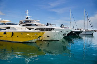 Luxury yachts docked in Puerto Banus, the marina of Marbella. Famous and Luxury location in Costa del Sol , Spain