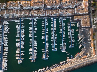 Aerial view of Puerto Banus , Marbella , at sunset. Luxury touristic destination in Costa del Sol , Spain.