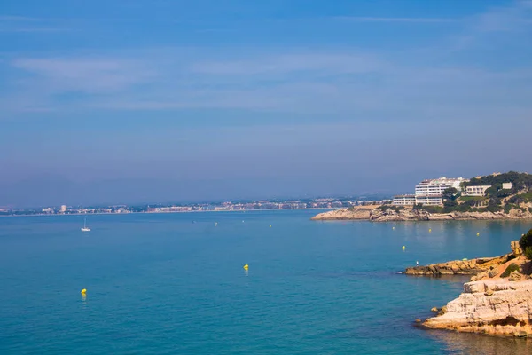 a beautiful view of the sea and the coastline in the summer of Spain