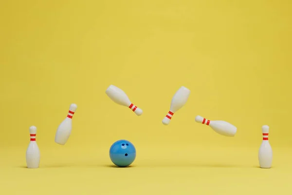 Kegel Fliegen Über Den Gelben Hintergrund Und Eine Blaue Bowlingkugel — Stockfoto
