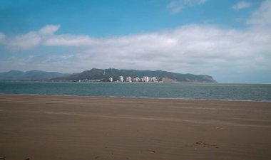 Panoramic view of the city of Bahia de Caraquez seen from San Vicente beach during a sunny day