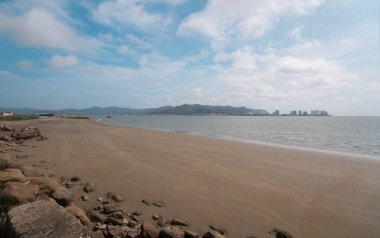 Panoramic view of the city of Bahia de Caraquez seen from San Vicente beach during a sunny day