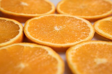 Detail of orange circular cuts boards