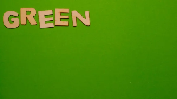 Wooden Letters Plain Colored Background Word Written English Green — Foto de Stock
