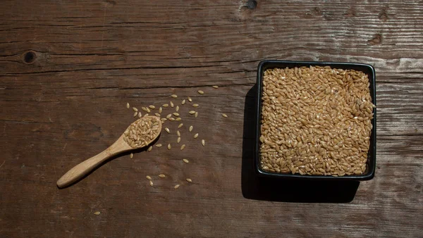 Flax Seeds Small Spoon Black Bowl — Stock Fotó