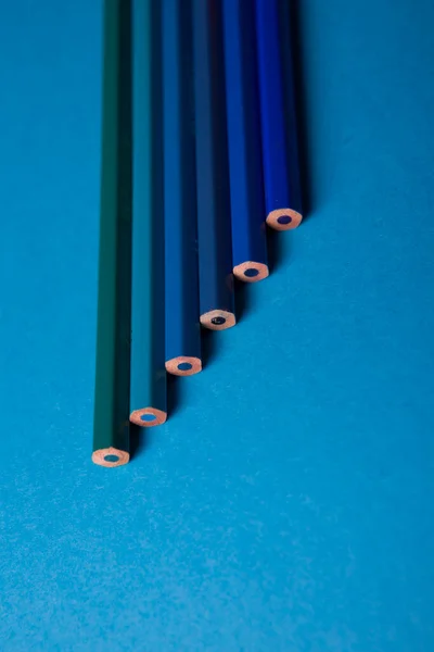 Wooden Pencils Different Shades Blue Blue Background — Zdjęcie stockowe