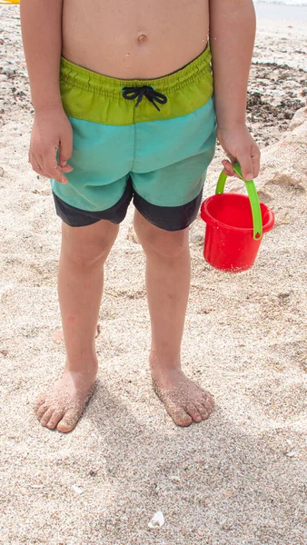 Four Year Old Boy Holding Toy Bucket Beach — стоковое фото