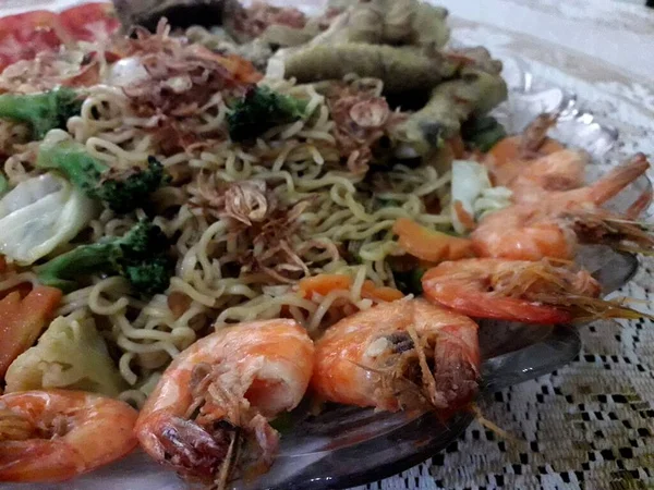 Special fried noodles on a special day with various toppings that are very appetizing