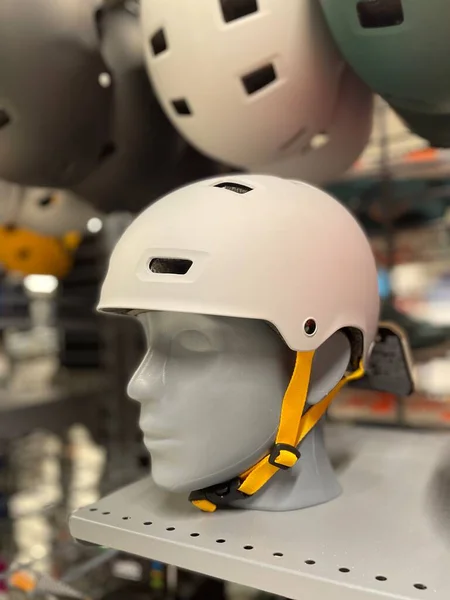 Mannequin with white helmet for hiking or cycling safety first