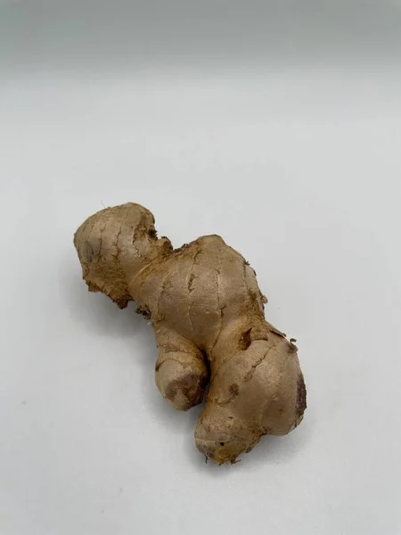 ginger root on a brown background, Javanese ginger, indonesian people call it jahe putih, one of kind rizoma that can be herbs or seasoning