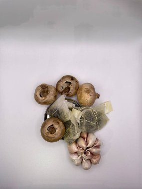 Mushrooms onions and garlic as groceries
