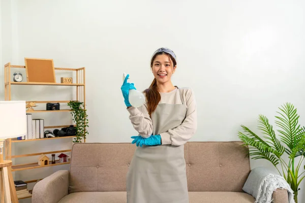 Housekeeper Wearing Protective Gloves Holding Cleanser Bottle Prepare Wiping Dirt — 图库照片