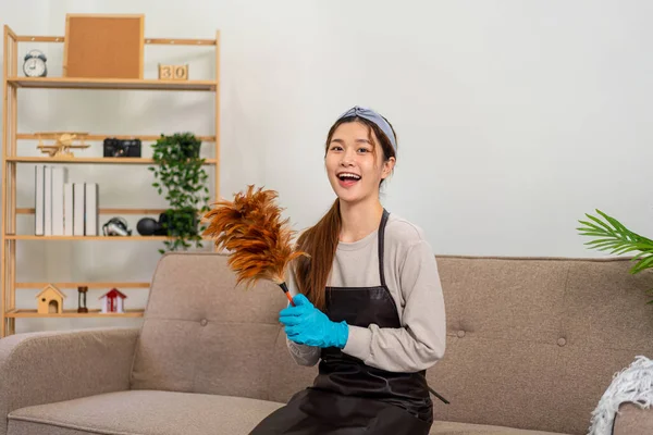 Housekeeper Wearing Protective Gloves Holding Feather Duster Cleanups Dusting Living — Foto Stock