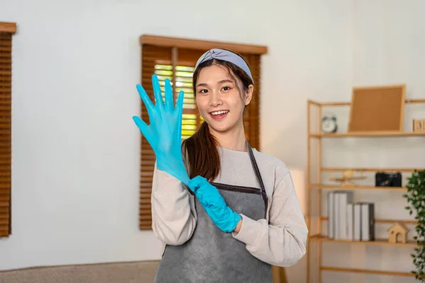 Housekeeper Standing Wearing Protective Gloves Prepares Cleaning Equipment Cleaning Wiping —  Fotos de Stock