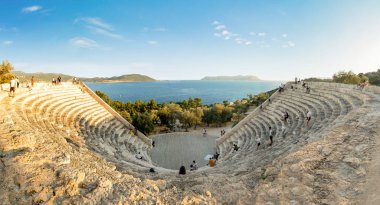 Ka, Antalya  Turkey - 07.02.2022: Night photo of people wandering in ancient amphitheater of Ka.