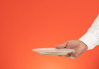 Close up photo of waiter holding empty plate for product advertisement  mock up.